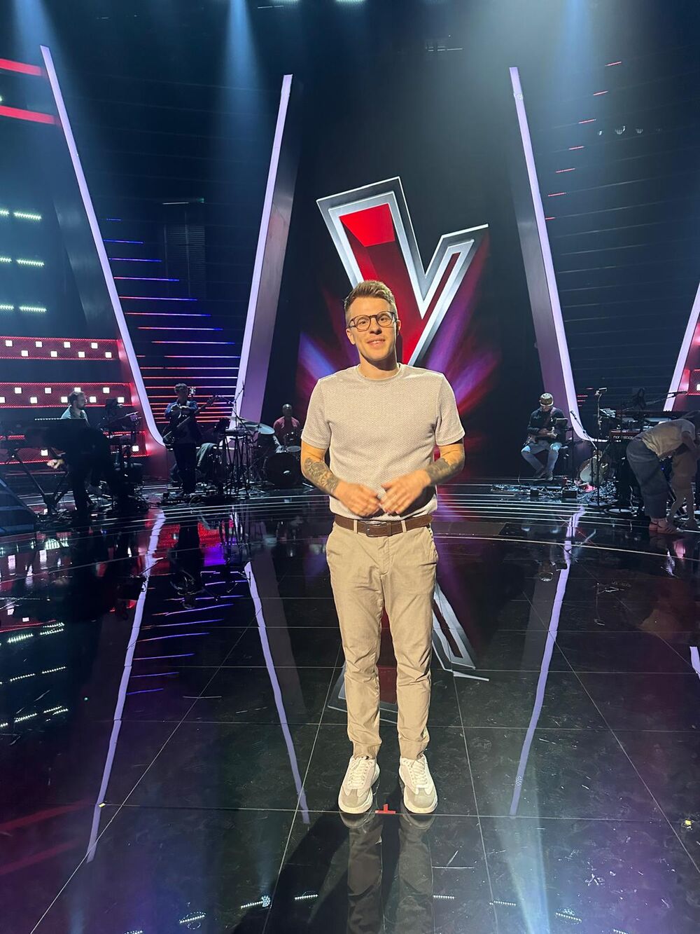 Nathan Grisdale standing on a television studio set